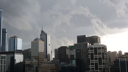 View of city against cloudy sky