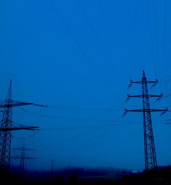 Low angle view of electricity pylon