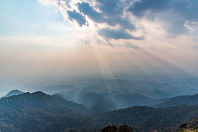 Scenic view of mountains against sky during sunset