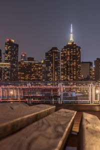 Illuminated buildings in city at night