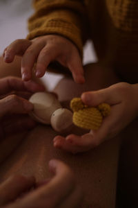 Close-up of hand holding ice cream