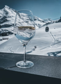 Close-up of wineglass on table