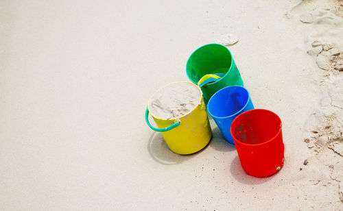 High angle view of sand in bucket