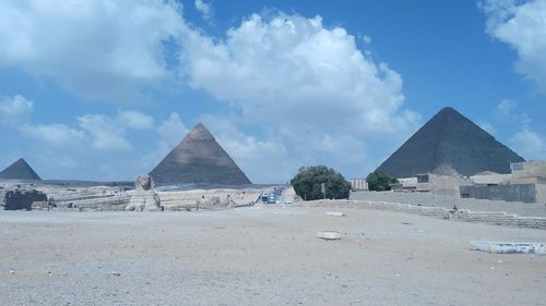 Panoramic view of town square against sky