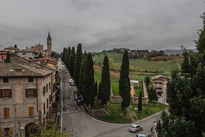 High angle view of road amidst buildings in city