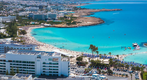 High angle view of cityscape by sea
