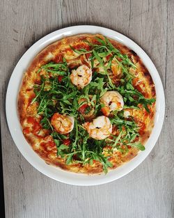 High angle view of pizza in bowl on table