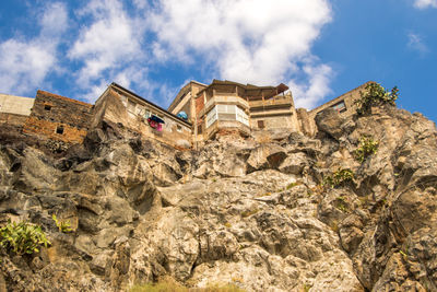 Low angle view of old building against sky