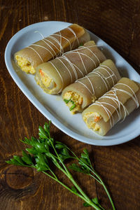Stuffed pork rind. dish of the ancient peasant tradition. served in a white dish.