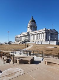 Low angle view of building against clear blue sky