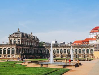 Buildings in city against sky