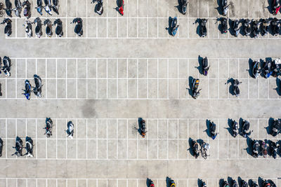 High angle view of people walking on building
