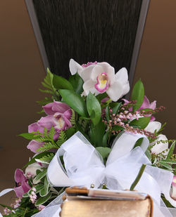 Close-up of pink flower vase on table at home