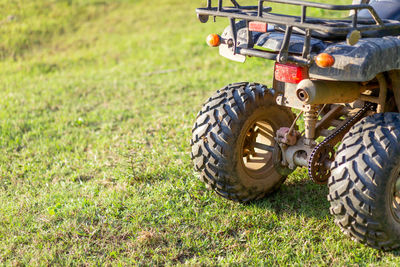 Close-up of car on field