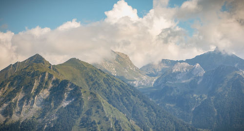 Scenic view of snowcapped mountains against sky