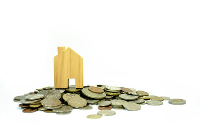 Close-up of coins on white background