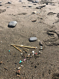 High angle view of stones on sand