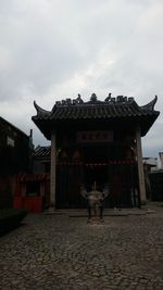 Exterior of temple against sky