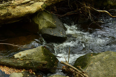 High angle view of water flowing in river