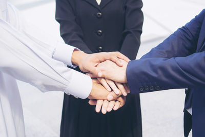 Low angle view of man holding hands