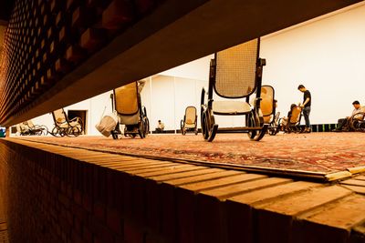 Rocking chairs on floor in building