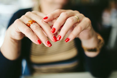 Midsection of woman with hands