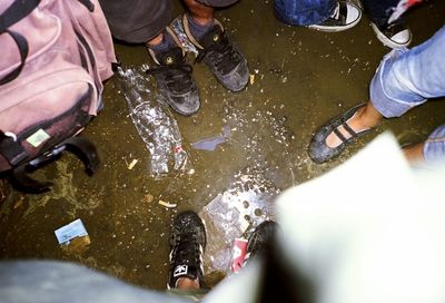 Low section of people standing in water