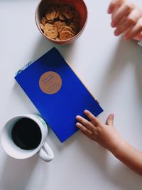 High angle view of coffee cup on table