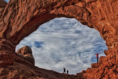 Low angle view of rock formation against sky