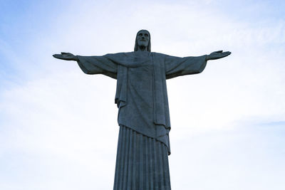 Low angle view of statue against sky