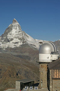 View of mountain range against clear sky