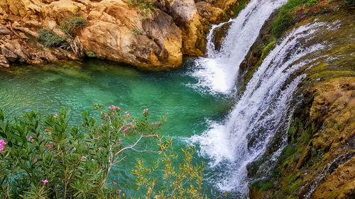 High angle view of waterfall in river