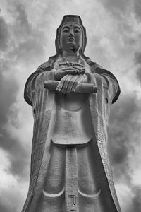 Low angle view of statue against sky