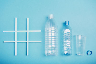 View of plastic bottles on blue background