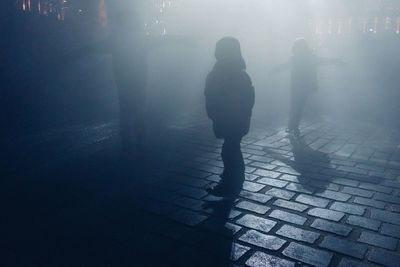 People on illuminated during night