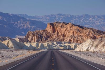 Scenic view of rocky mountains against clear sky