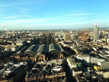 High angle view of city buildings against sky