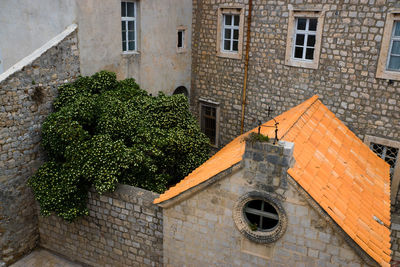 High section of church against stone wall