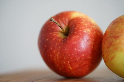 Close-up of apple on white background