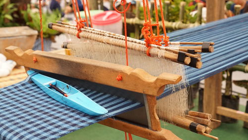 Close-up of wooden loom at industry