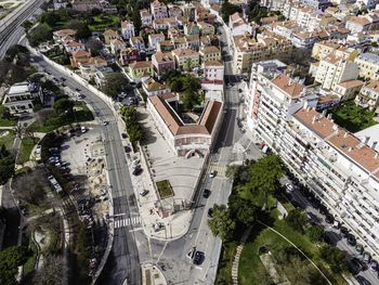 High angle view of street amidst buildings in city