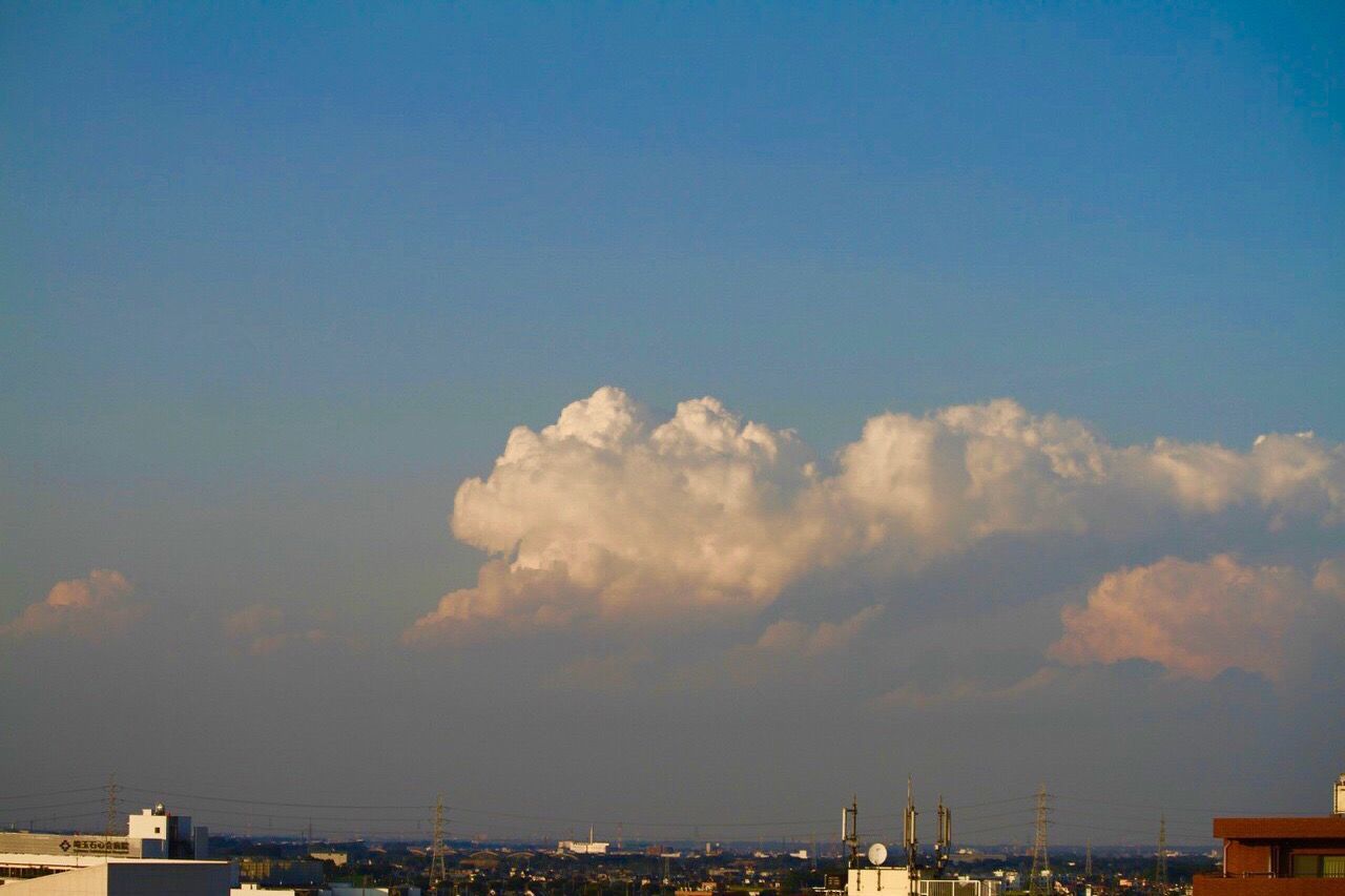 PANORAMIC VIEW OF CITYSCAPE AGAINST SKY