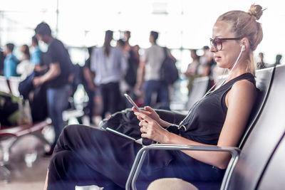 People sitting on mobile phone