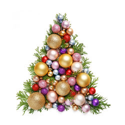 Close-up of christmas tree against white background