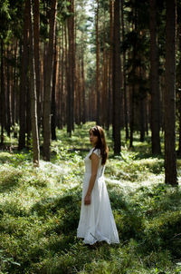 Portrait of woman in forest