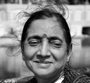 Close-up portrait of a smiling woman