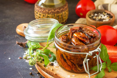 Close-up of fruits in jar on table