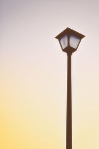 Low angle view of street light against clear sky