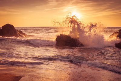 Scenic view of sea against sky during sunset