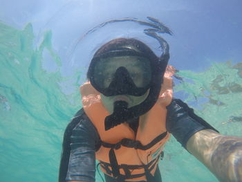 Portrait of man snorkeling undersea